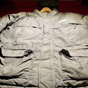 Men’s North Face 550.  Damaged Right Sleeve and Missing hood